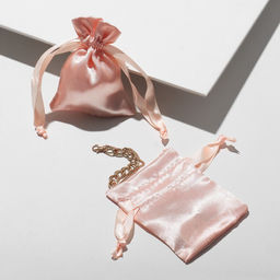 Цена за 50 шт. Мешочек подарочный атласный, 7x9см, цвет кремовый