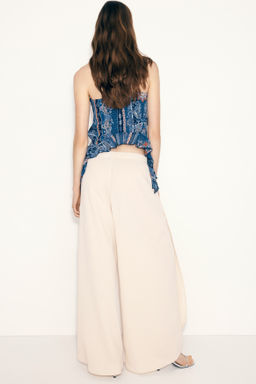 Pantal?n amplio con detalle cruzado - H&m фото 5