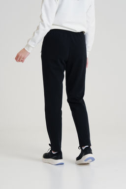 Брюки трикотажные удлиненные Черный TRN ESSENTIAL Knit Track Pants - Anta фото 4