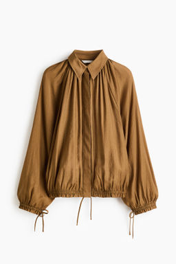 Camisa oversize con cordones de ajuste