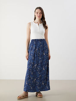 Beli Lastikli ?i?ekli Etek