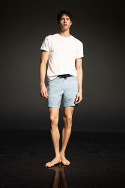 DeFactoFit Regular Fit Bask?l? Esnek Dokulu Diz Boyu Sporcu Deniz Sortu