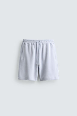 BERMUDA JOGGER RELAXED FIT INTERLOCK / Celeste