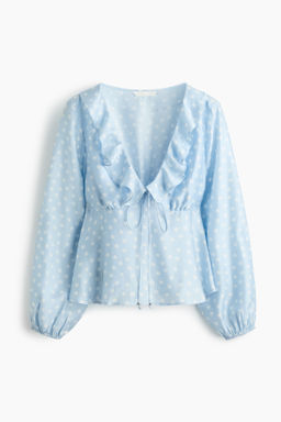 Blusa con volantes