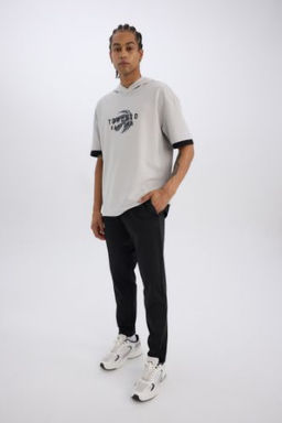 DeFactoFit Sporcu Jogger Esofman Alt? Slim Fit Dar Kesim Standart Paca Skuba Dalg?c Kumas Beli Lastikli Duz Paca