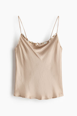 Top de tirantes con detalles decorativos
