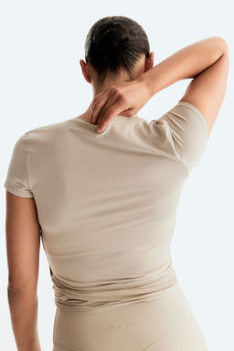 Top de deporte cruzado en modal - H&m фото 8
