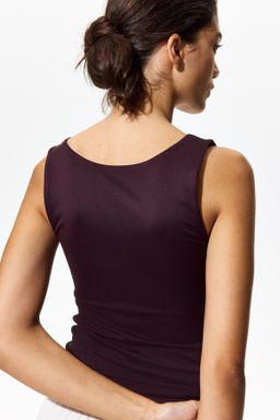 Top sin mangas en microfibra - H&m фото 9