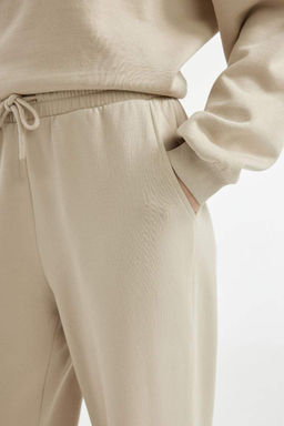 Простые спортивные штаны с широкими штанинами, эластичной талией, шнуровкой, карманами и широкими штанинами - Defacto фото 5