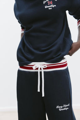 TROUSERS WITH EMBROIDERED SLOGAN - Zara фото 2