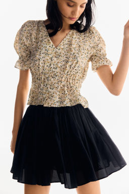 Blusa con peplum