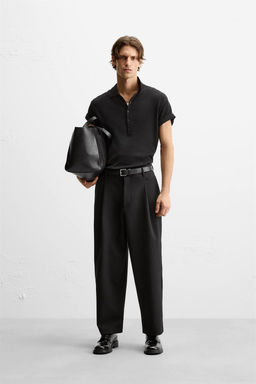 RELAXED FIT PLEATED TROUSERS
