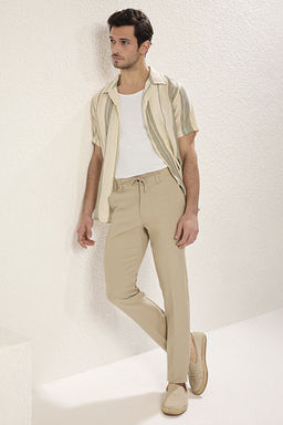 Ta_ Slim Fit Beli Ba_lama Detayl_ Lastikli Kuma_ Dokuma Pantolon TMNAW25PL00027