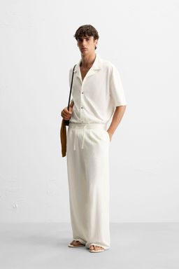 RELAXED FIT TEXTURED TROUSERS - Zara фото 4
