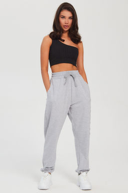 Брюки "бананы" с серым принтом