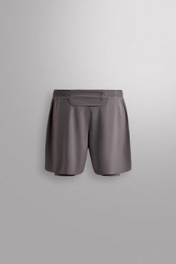 PANTALONES CORTOS RUNNING 2 EN 1 / Morado