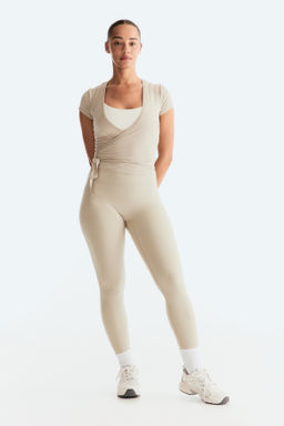 Top de deporte cruzado en modal - H&m фото 5