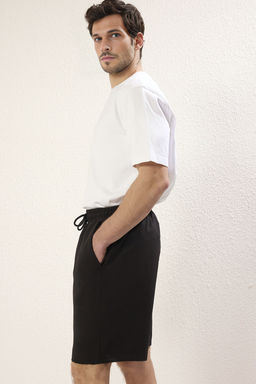 Basic Siyah Oversize/Genis Kesim Lastik Belli Bagc?kl? Sort TMNSS22SR0257