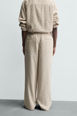 STRIPED WRINKLED-EFFECT FLOWING TROUSERS - Zara фото 3