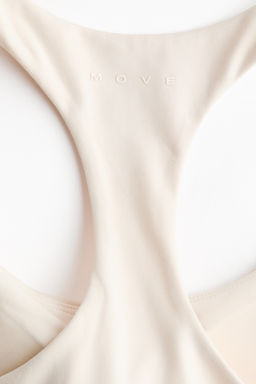 Top de deporte SoftMove con sujetador integrado - H&m фото 5