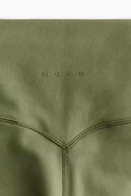Leggings de yoga acampanados con SoftMove - H&m фото 13