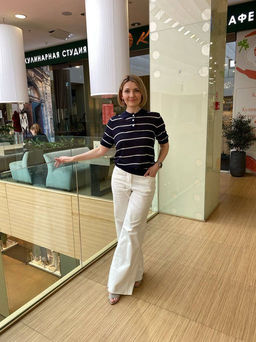 Джинсы клеш с прорезями и необработанным краем из эластичного денима средней плотности - Vilatte фото 10