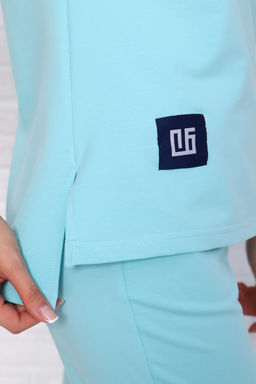 Костюм женский трикотажный мод. 2002 ТрК. Цвет:светло-бирюзовый - Стильб фото 3