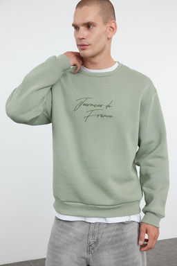 TRENDYOL MAN Tas Oversize/Genis Kesim Yaz? Nak?sl? Kal?n Ici Polar Sweatshirt TMNAW25SW00091