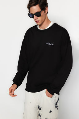 Siyah Premium Bisiklet Yaka Oversize/Genis Kesim Yaz? Nak?sl? Sardonsuz Sweatshirt TMNAW24SW00039