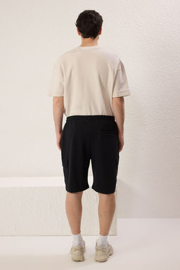 TRENDYOL MAN Siyah Oversize/Genis Kesim Gizli Kordonlu Lastik Belli Kargo Cepli Etiketli Sort TMNSS24SR00018 - Trendyolmilla фото 4