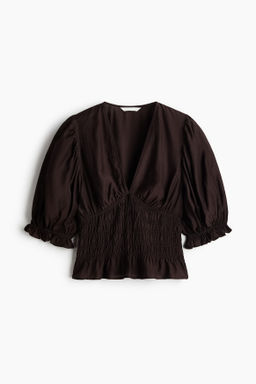 Blusa con cintura nido de abeja