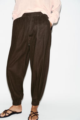 PANTAL?N JOGGER BAJO PU?O / Marr?n oscuro