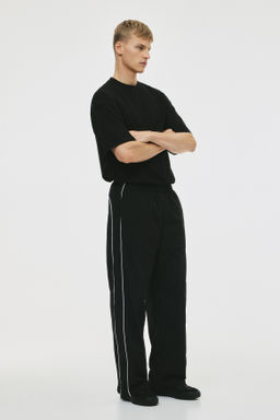 Pantal?n de ch?ndal en nailon Relaxed Fit - H&m фото 2