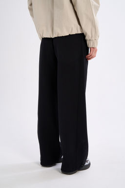 Брюки трикотажные Черный TRN Knit Track Pants - Anta фото 7
