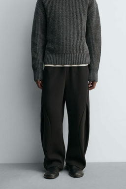 NEOPRENE-EFFECT PLEATED BALLOON FIT TROUSERS