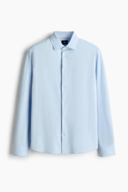 Camisa en tejido el?stico multidirecci?n Slim Fit