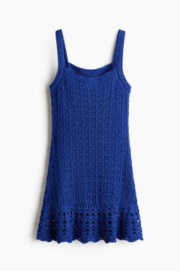 Vestido en punto pointelle con volante