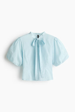 Blusa con mangas abullonadas