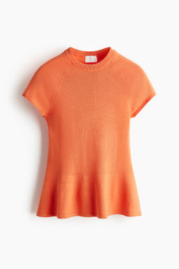 Top en punto fino con peplum