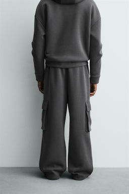 NEOPRENE-EFFECT PLEATED CARGO TROUSERS - Zara фото 3