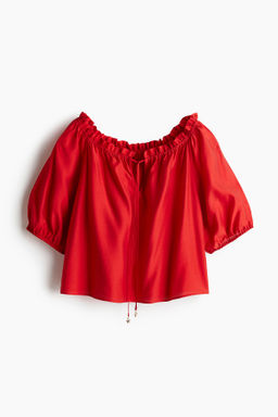 Blusa con ribete de volantes