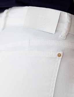 Джинсы клеш с прорезями и необработанным краем из эластичного денима средней плотности - Vilatte фото 3