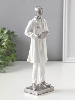 Сувенир полистоун "Мужчина-доктор в белом халате с медицинской картой" 25,5 см