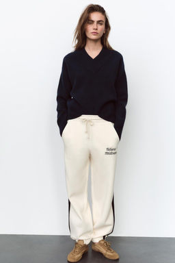JOGGING TROUSERS WITH SLOGAN