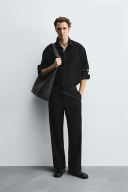 RELAXED FIT FLOWING TROUSERS