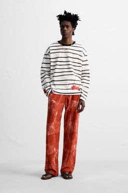 GRAPHIC PRINT KNIT TROUSERS  OTIS KWAME KYE QUAICOE