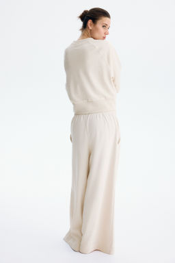 Pantal?n con cord?n de ajuste y pliegue decorativo - H&m фото 8