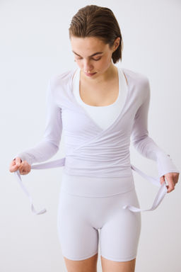 Top de deporte cruzado en modal - H&m фото 16