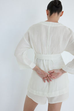 MAMA Blusa cruzada con cinturon de anudar - H&m фото 4