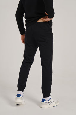 Брюки трикотажные Черный TRN ESSENTIAL Knit Track Pants - Anta фото 6